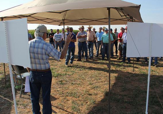 Project Manager Leon New discussing the progress of the 3, 4, 5 demonstration project