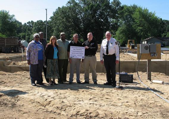 From left: Township Treasurer Jessie Lowery, Trustee Steve Black, Township Clerk Jackie King, Township Trustee Bruce Ferguson, Township Supervisor Steve Miller, USDA Rural Development Specialist Paul Bristol, Fire Chief Nelvin DeWeerd.