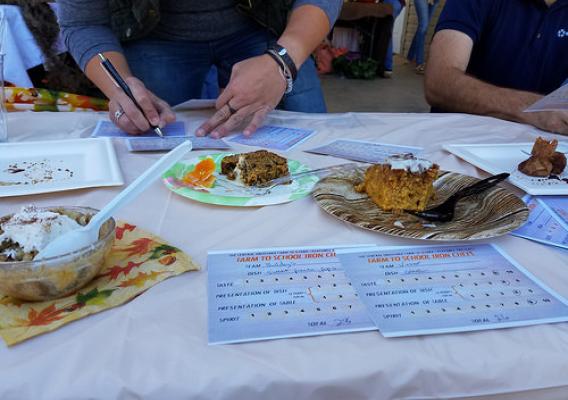 Judges deliberating during the Central Louisiana Farm to School Iron Chef Competition