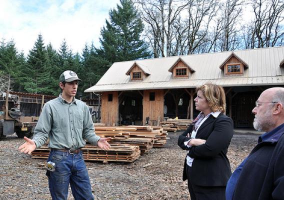 Ben Deumling (left) explains Zena Forest Products’ land management, harvest, and milling operations to USDA’s Lillian Salerno (center) and Martin Zone.