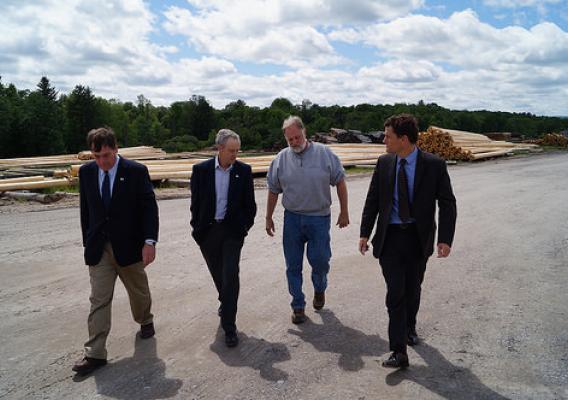 Administrator Sam Rikkers touring the lumber yard