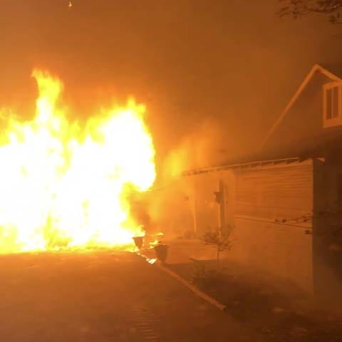 shed fire spreading to house