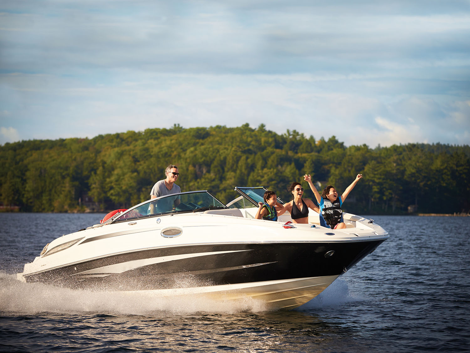 a family on a boat