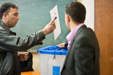 Iraqi citizens at the ballot box