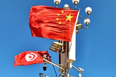 Chinese and Tunisian flags on display in Beijing in 2024 - source: Reuters