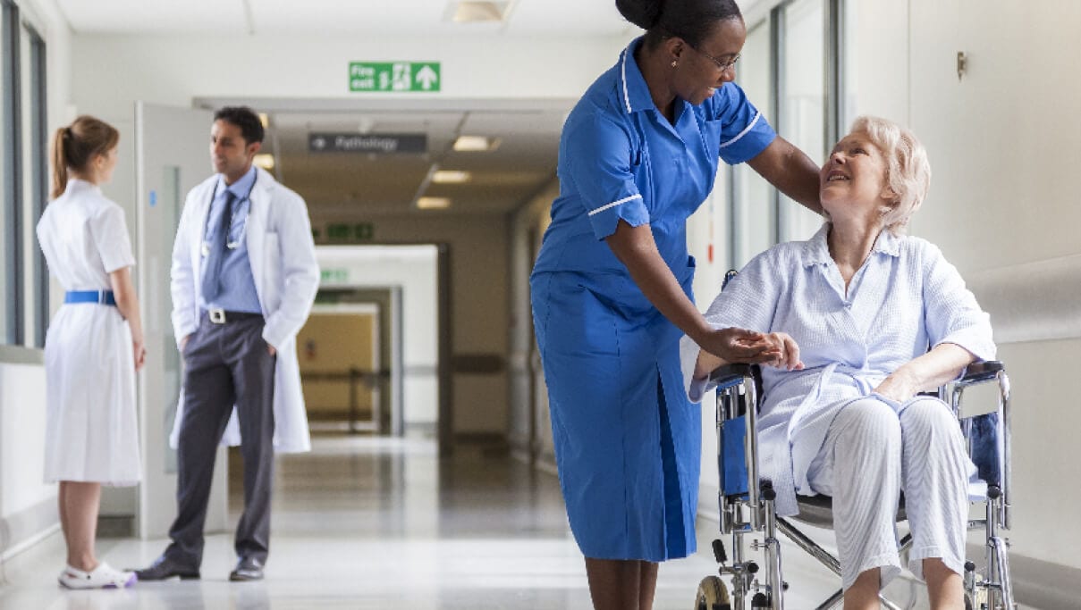 A group of people inside a hospital