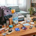 Items for a disaster kit are displayed on a coffee table.