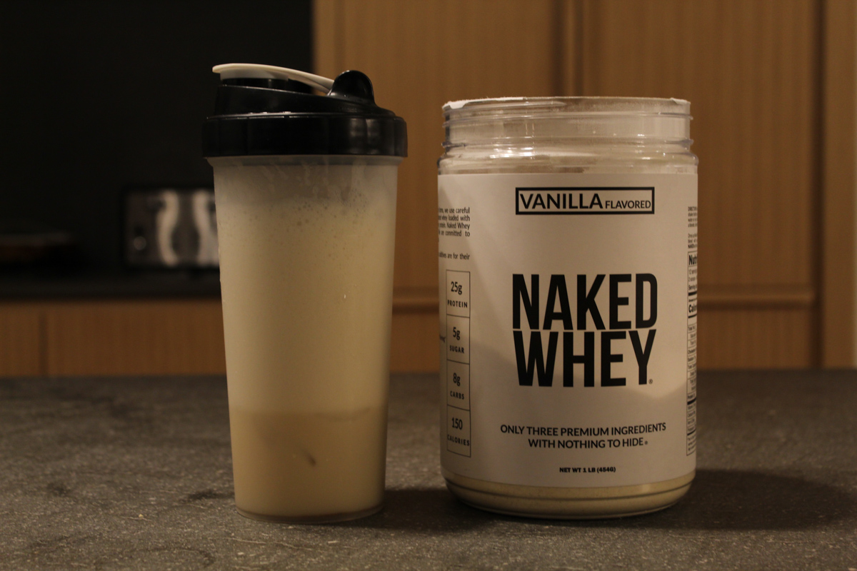 Naked Nutrition Whey Protein vanilla flavor shaker bottle