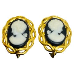 NAPIER signed vintage gold tone faux cameo designer clip on earrings