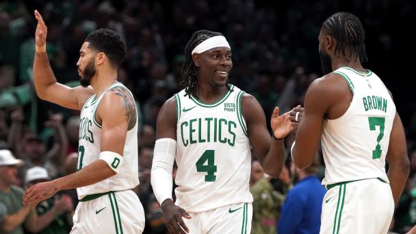 Jayson Tatum, guard Jrue Holiday, and guard Jaylen Brown celebrate the win