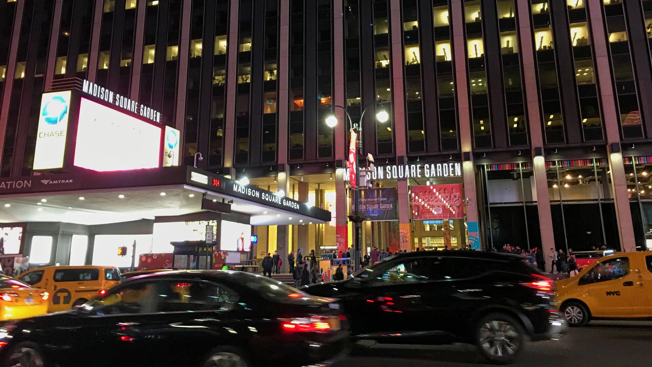 Madison Square Garden featuring night scenes, street scenes and a city