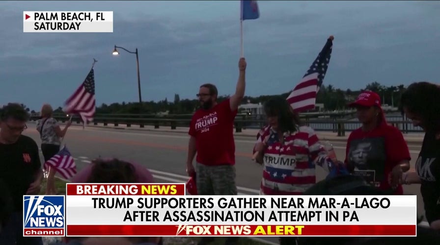 Trump supporters gather near Mar-a-Lago after rally shooting