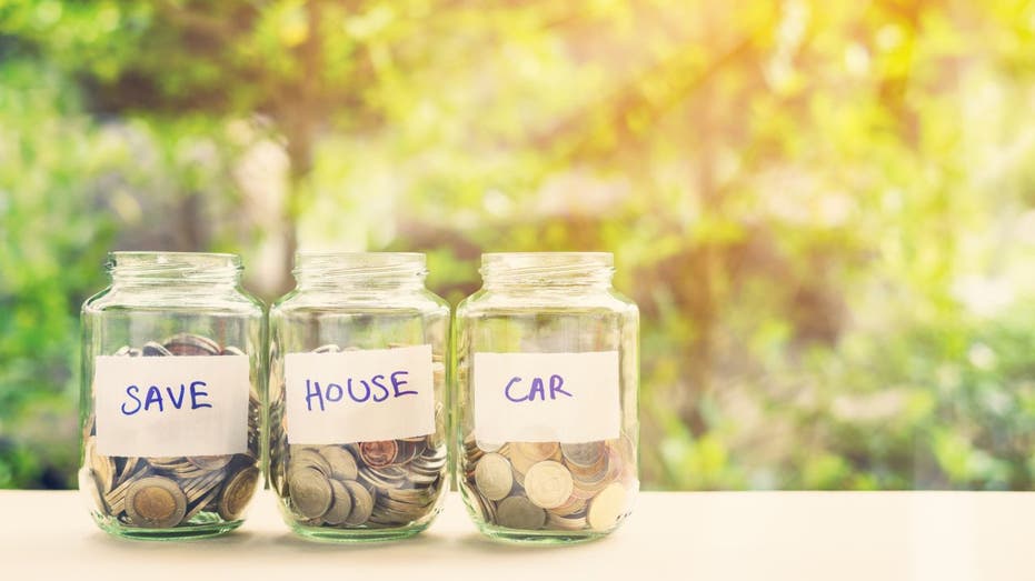 Labeled jars with coins inside