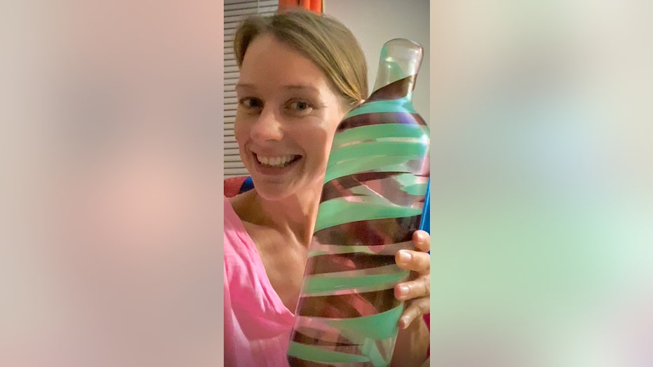 Jessica holding murano vase