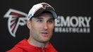 Quarterback Kirk Cousins #18 of the Atlanta Falcons speaks to the media during OTA offseason workouts at the Atlanta Falcons training facility on May 14, 2024 in Flowery Branch, Georgia.