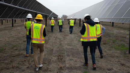 A tour group looks around the ENGIE Sun Valley Solar project in Hill County, Texas, on March 1, 2023.