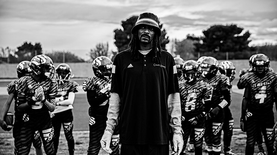 Snoop Dogg on football field