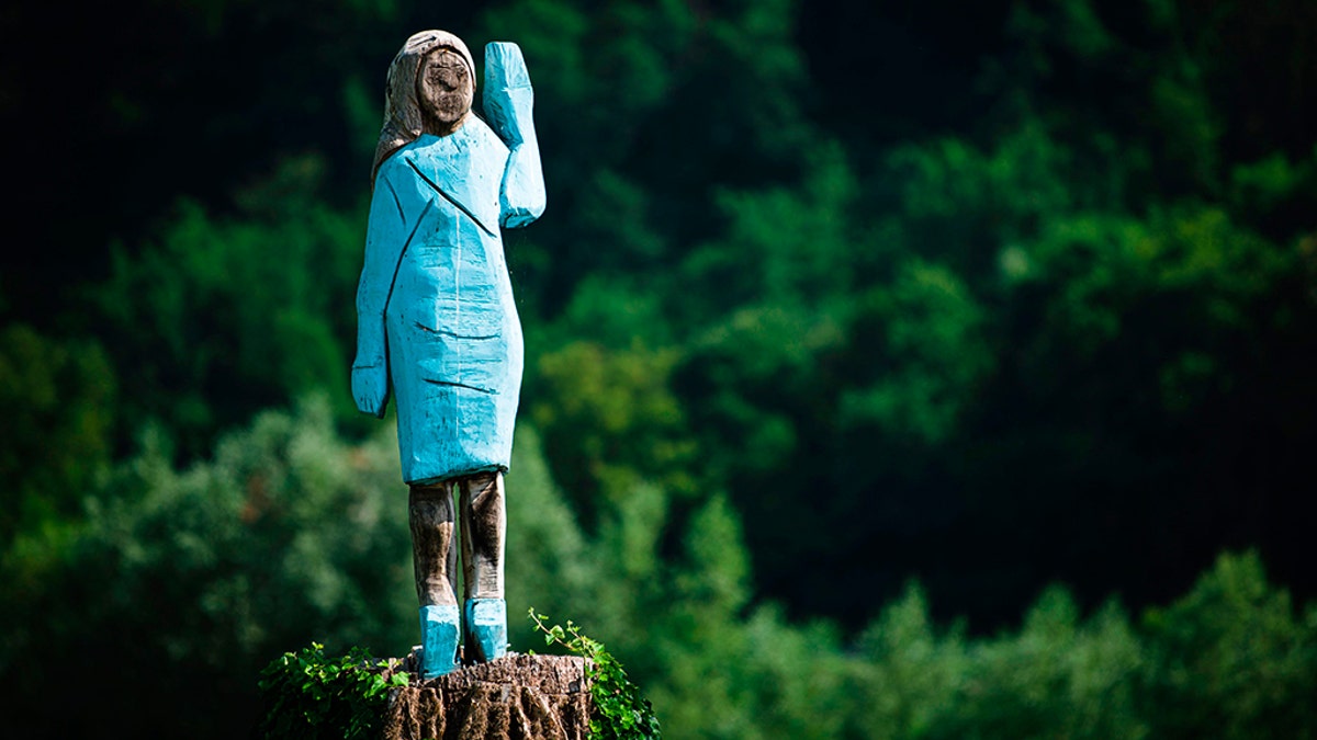 The original wooden statue of Melania Trump is seen near her hometown in Slovenia before it was damaged in July. (Photo credit should read JURE MAKOVEC/AFP/Getty Images)