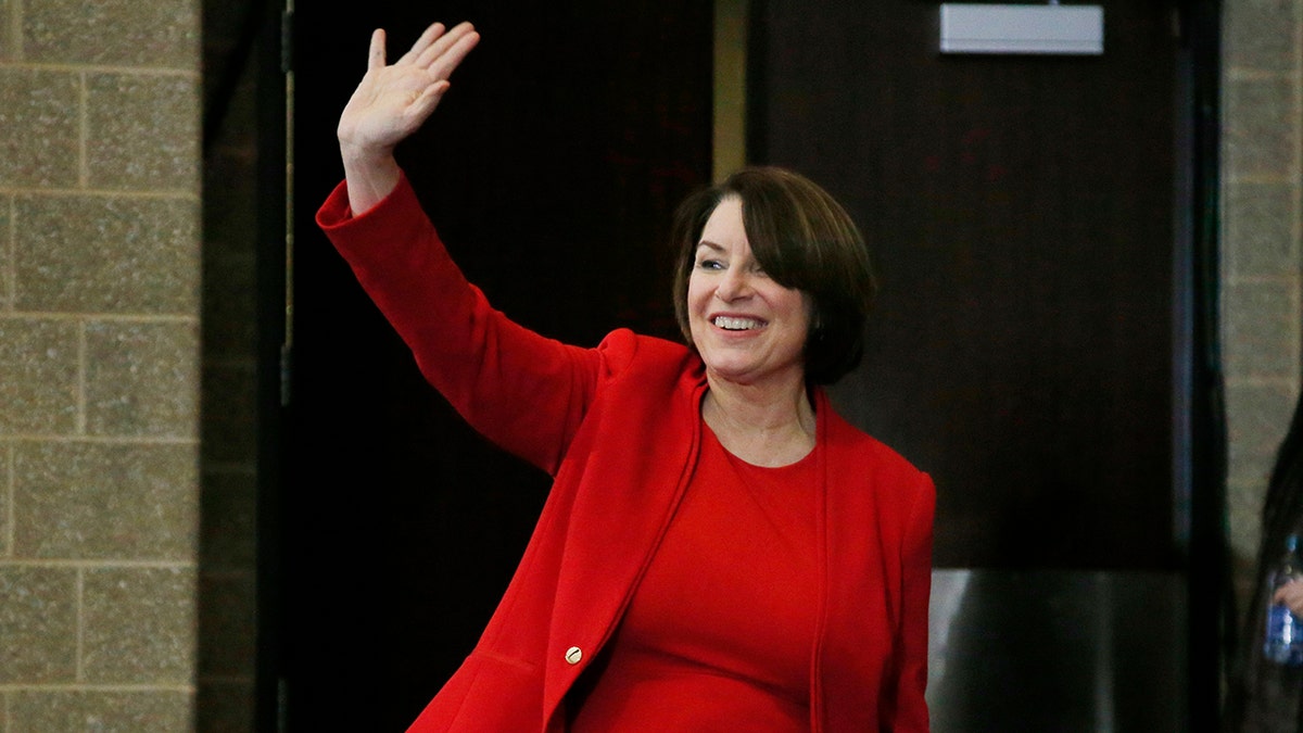 Sen. Amy Klobuchar, D-Minn., waves as she arrives to speak to the Scott County Iowa Democrats Saturday, Jan. 25, 2020, in Bettendorf, Iowa. In a Senate hearing last month Klobuchar warned that GOP-backed election bills are aimed at suppressing vote turnout. (AP Photo/Sue Ogrocki)