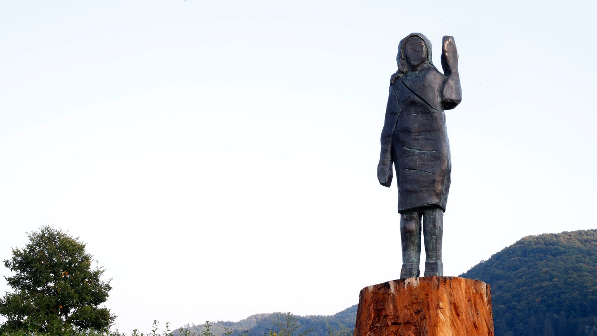 A bronze statue representing the U.S first lady Melania Trump made by Brad Downey, a Berlin-based U.S. artist, is erected in her birthplace of Sevnica, Slovenia, Tuesday, Sept. 15, 2020, after a previous one, made in wood, was set alight. Melania Trump was born and grew up in Slovenia before moving abroad as a fashion model. (AP Photo)