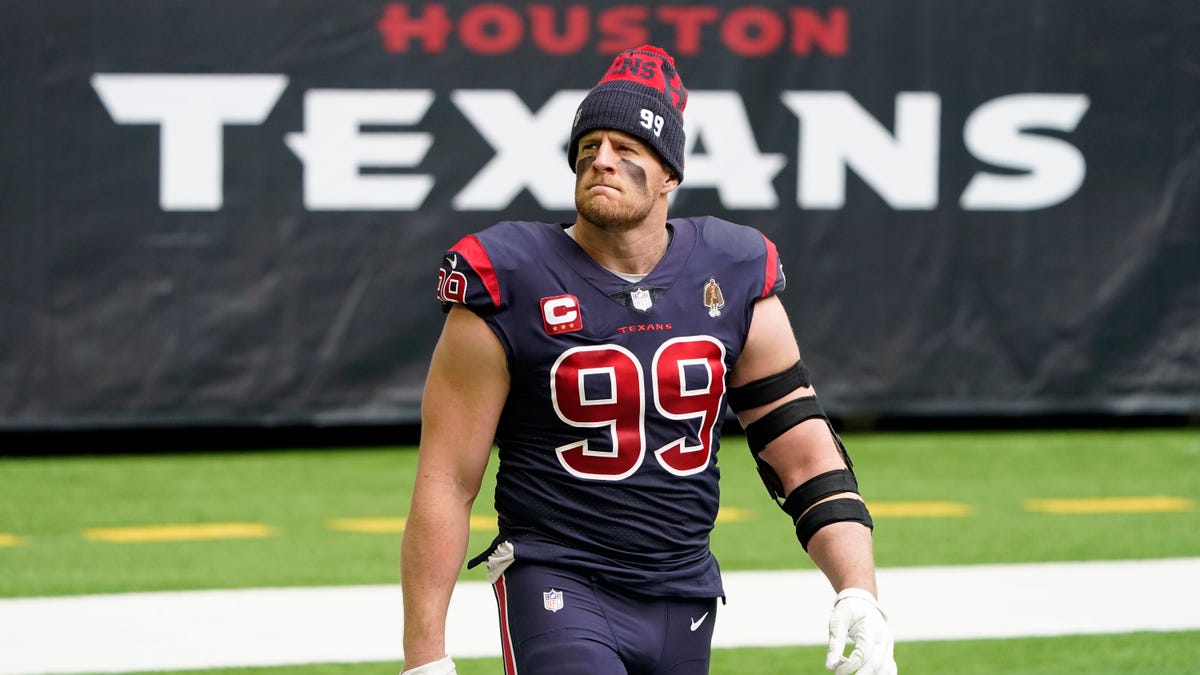 J.J. Watt walks on the field