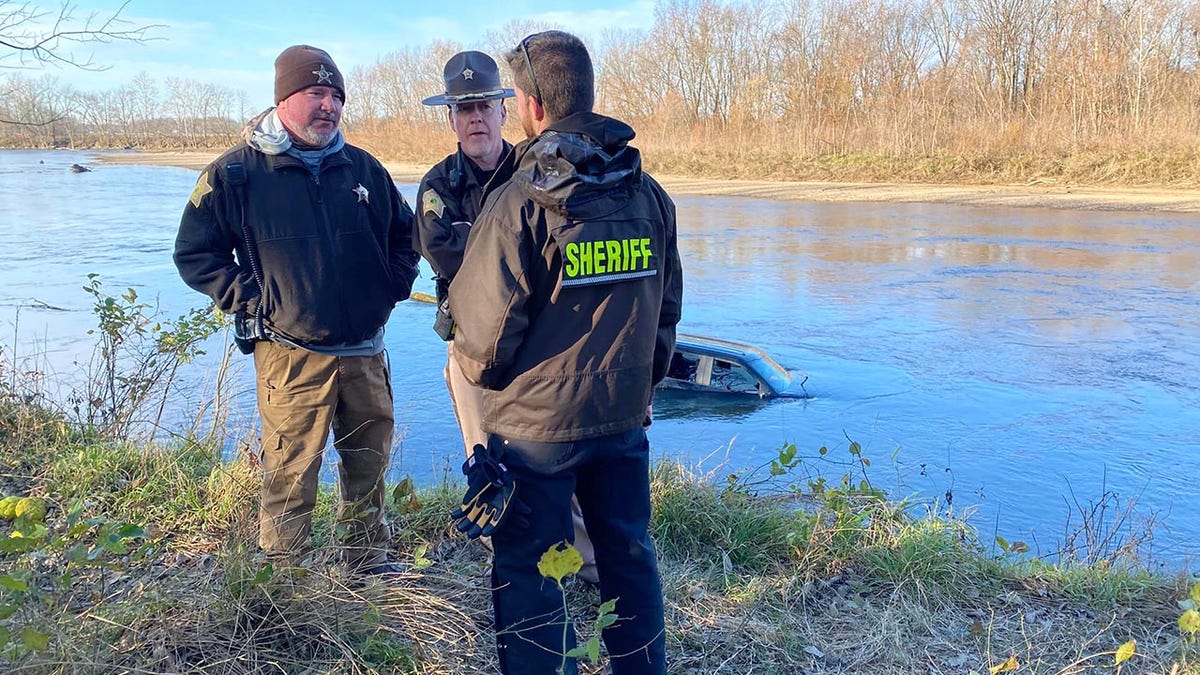 Law enforcement officers in Indiana in November along the White River.