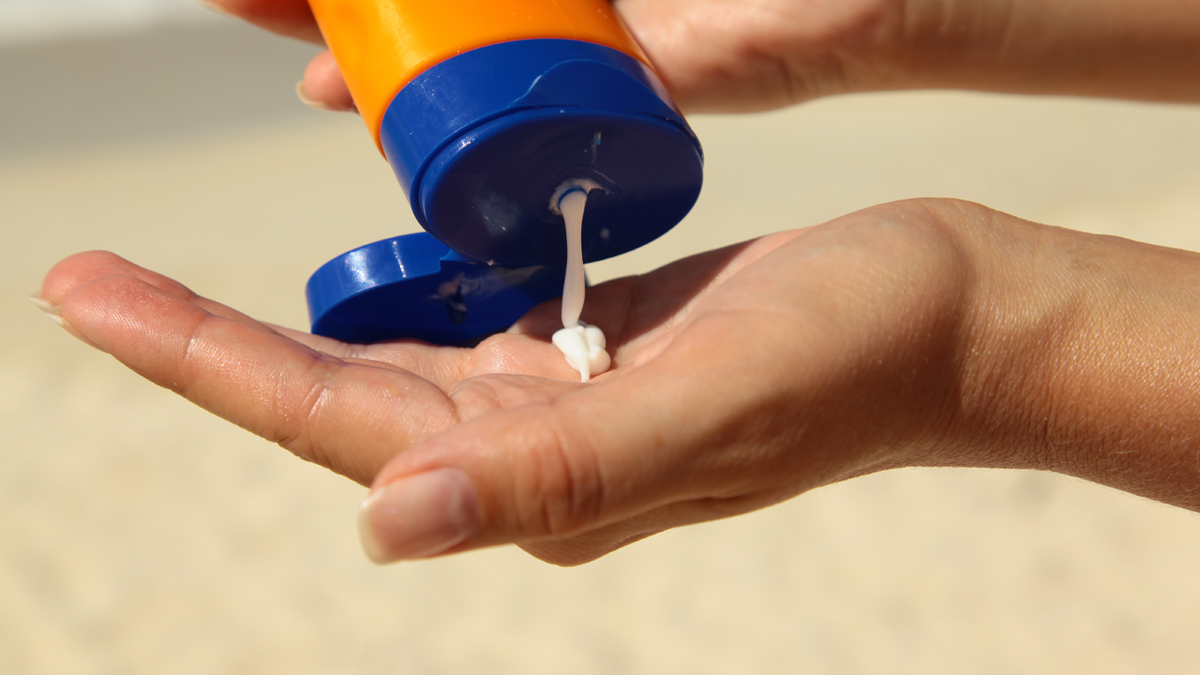 Sunscreen cream in a hand