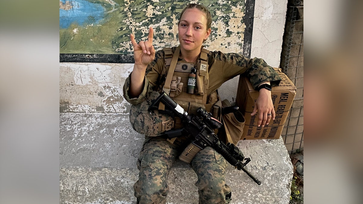 Sgt. Nicole Gee poses in Marine tactical gear