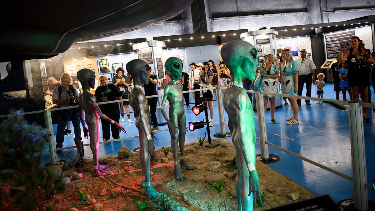 Aliens at museum exhibit