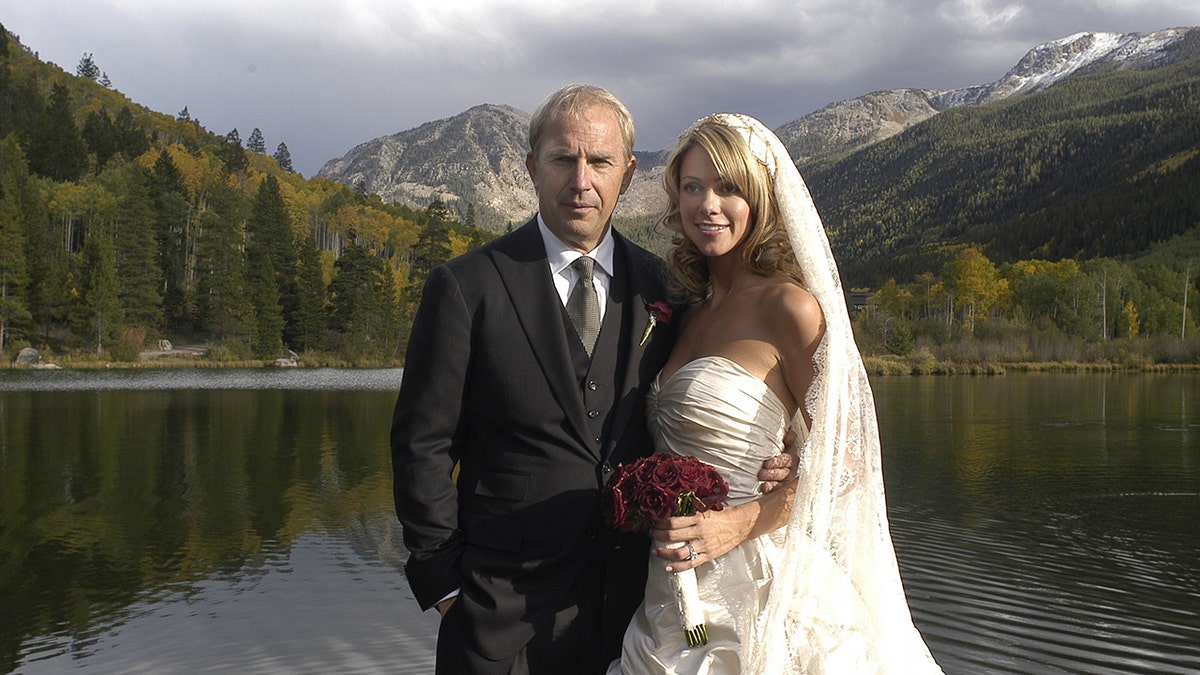 Kevin Costner wears black suit at wedding to Christine Baumgartner