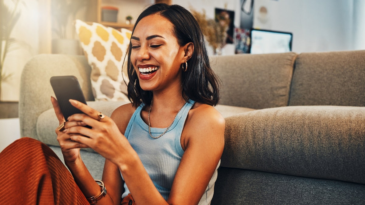 Young woman laughing