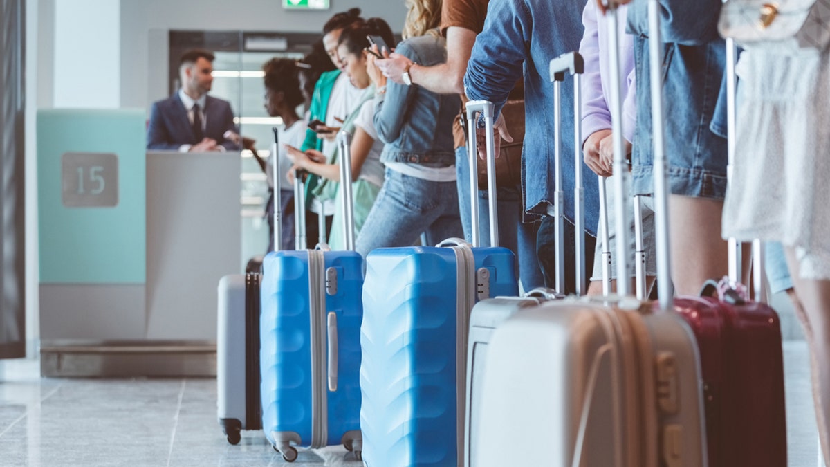 Passengers waiting to get on plane