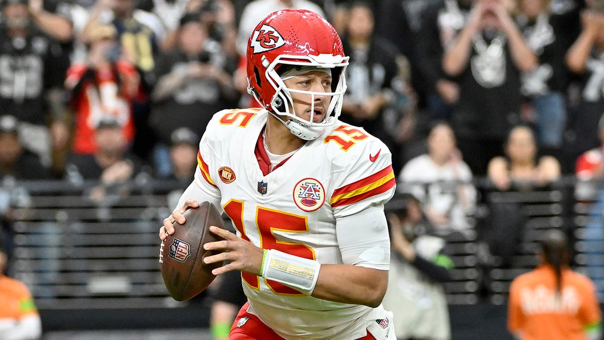 Patrick Mahomes looks down field