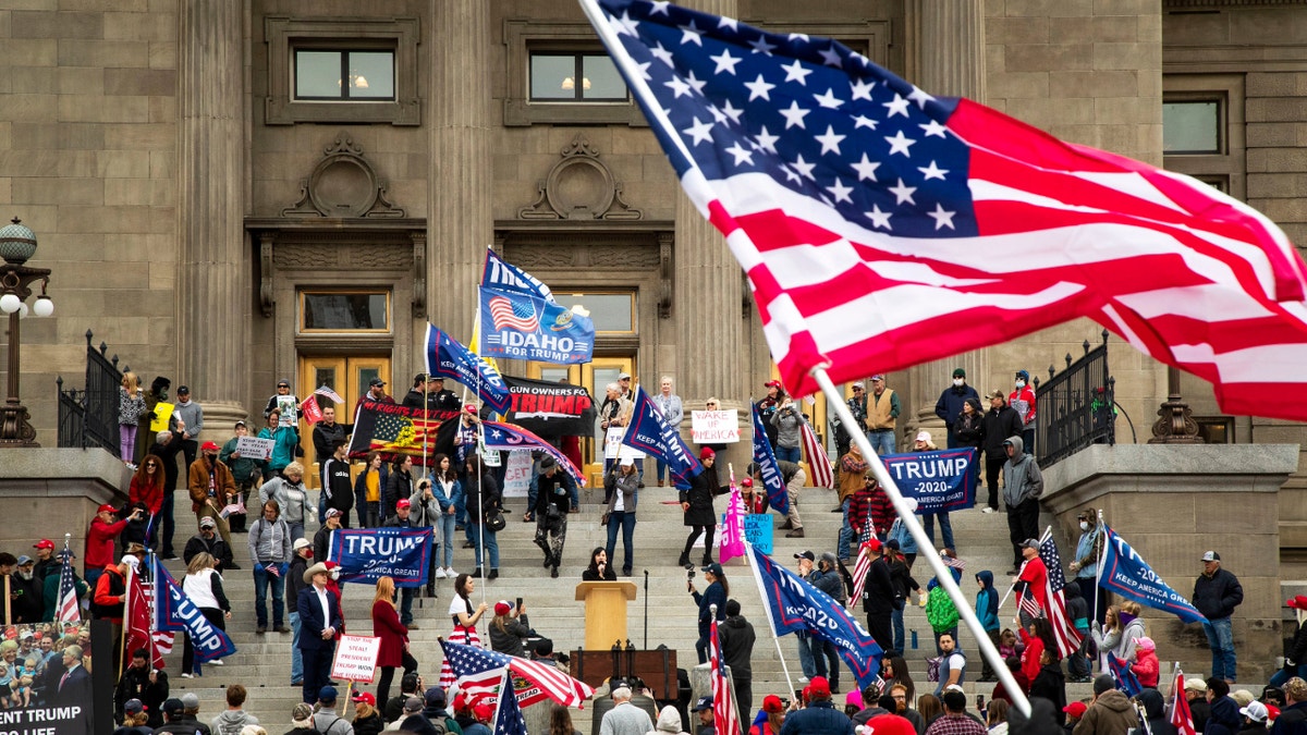 Hundreds of Trump supporters gather at the Idaho Statehouse in Boise, Idaho, November 7, 2020, following the announcement that Joe Biden had won the U.S. presidential election. 