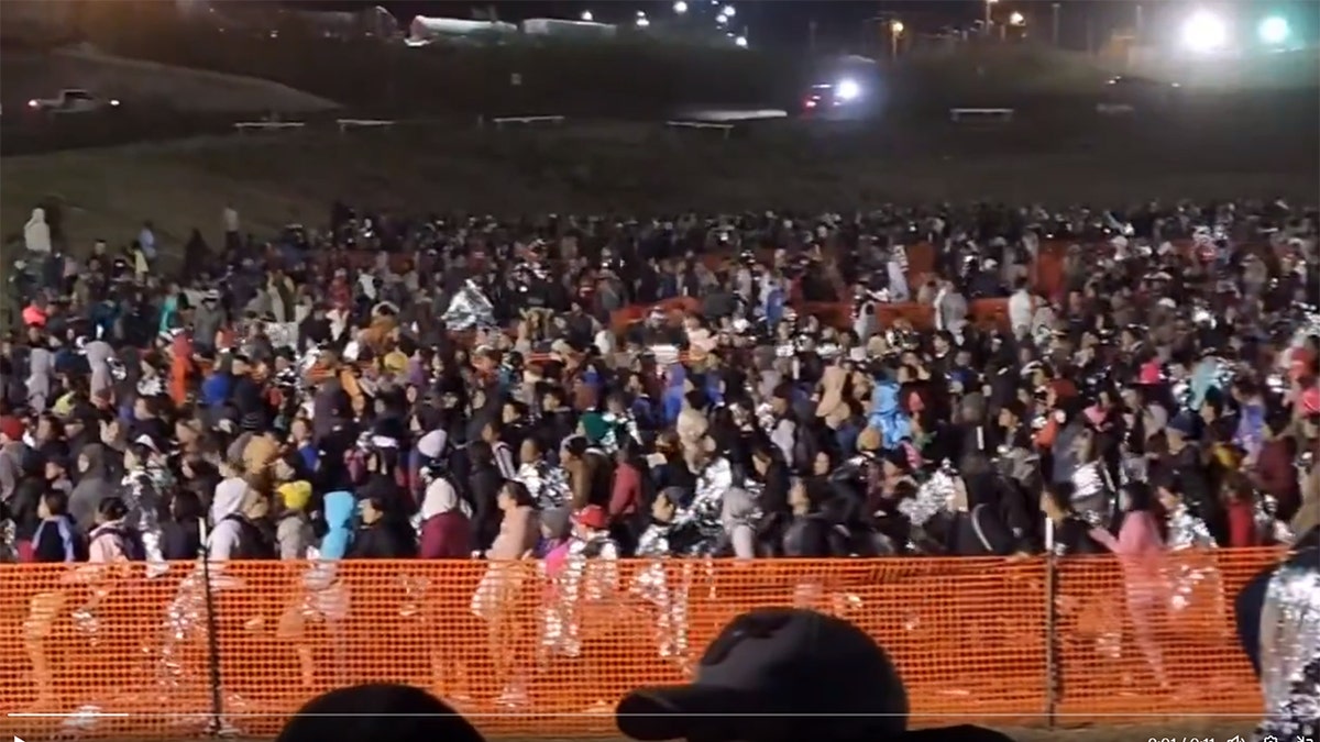 Migrants flood into Eagle Pass, Texas, waiting to be processed Dec. 18, 2023.