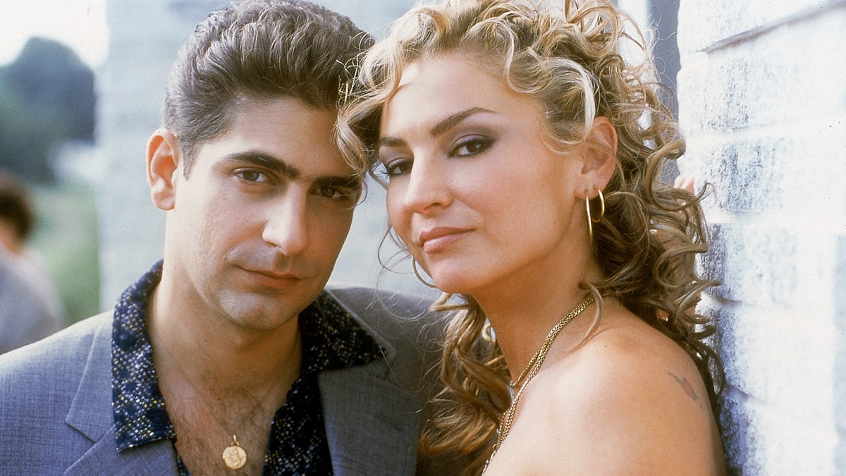 Michael Imperioli as Christopher Moltisanti and Drea de Matteo as Adriana La Cerva