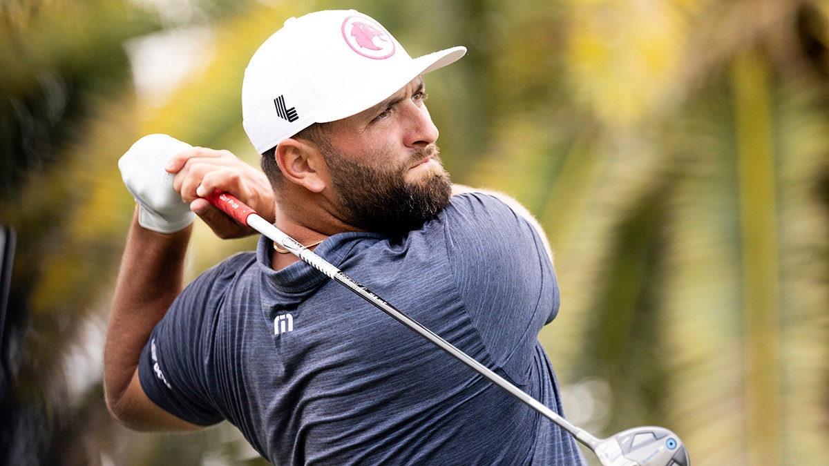 Jon Rahm swings