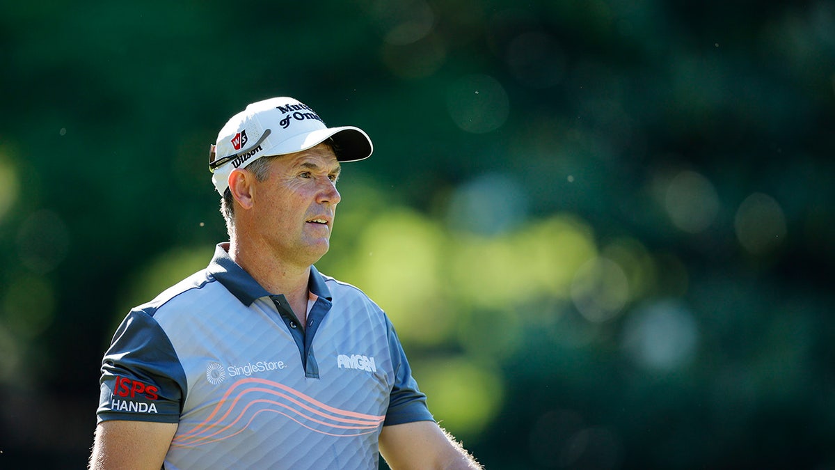 Padraig Harrington walks the green