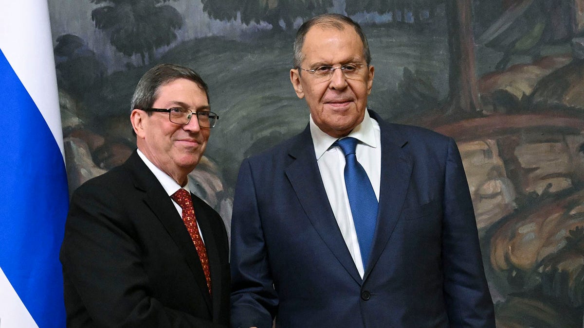 Russian Foreign Minister Sergey Lavrov, right, and his Cuban counterpart Bruno Eduardo Rodríguez Parrilla