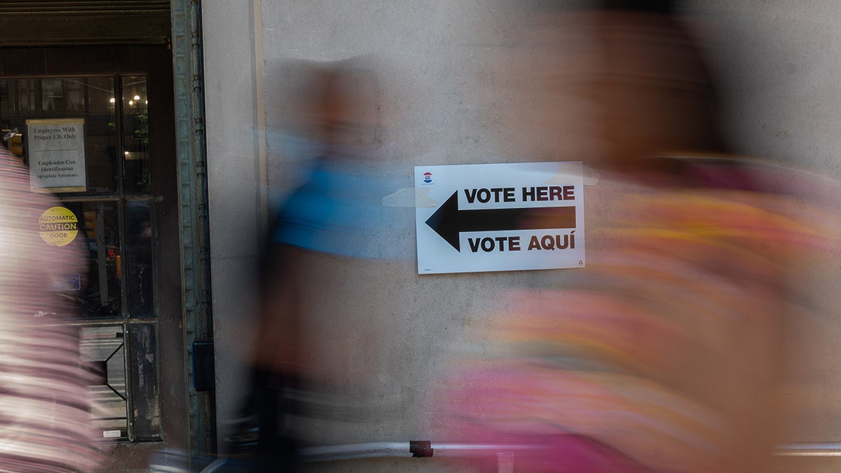 Vote here sign in NYC