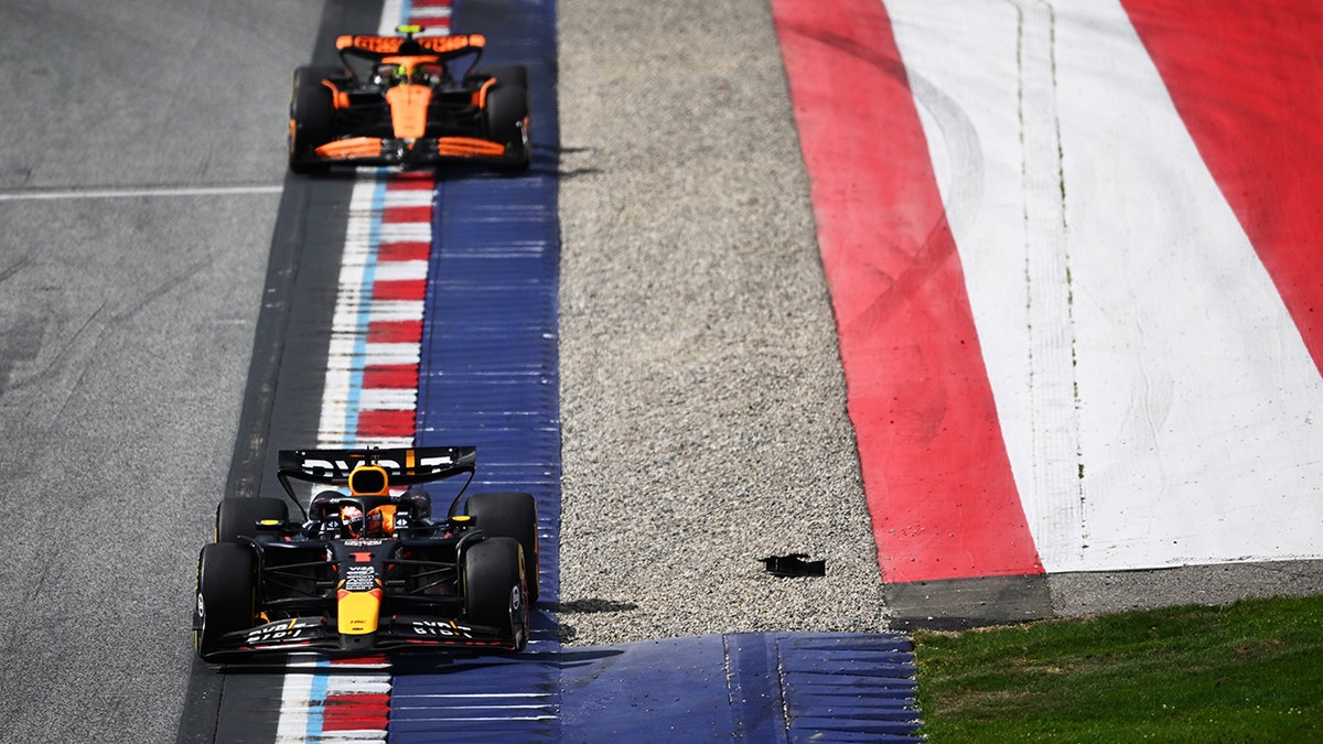 Max Verstappen leads Lando Norris