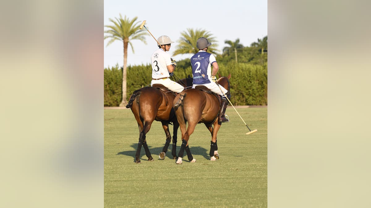 Nacho Figueras and Prince Harry on horseback in polo gear