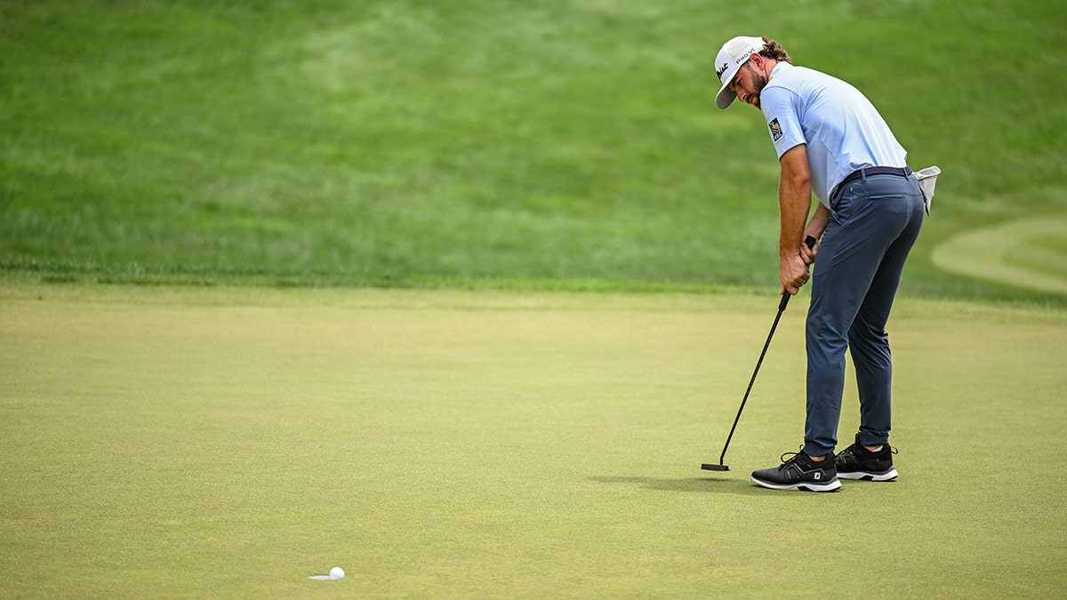 Cam Young putting