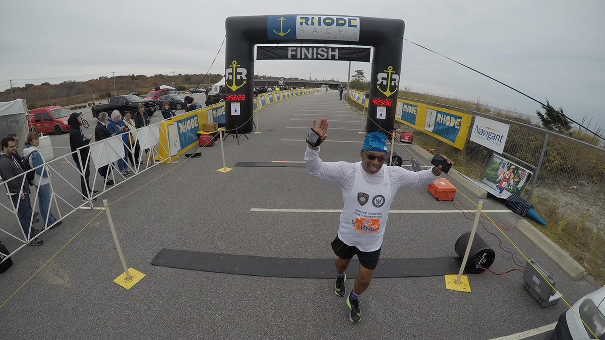 john barnett finishes a marathon in rhode island