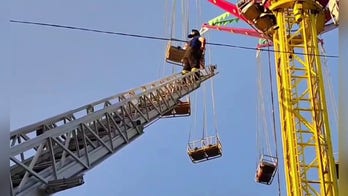 WATCH: Russian amusement park ride malfunctions, trapping a dozen people 50 feet in the air