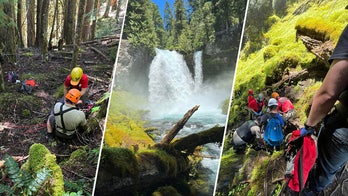 Hiker takes tumble off waterfall as crews use rope system to execute elaborate rescue