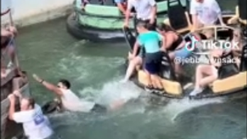 Six Flags Roaring Rapids ride malfunction leads guests to leap into the water, video shows