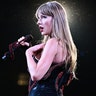 Taylor Swift looked to the audience in her black "Reputation Era" jumpsuit, following her announcement the Eras Tour will end in December 2024.