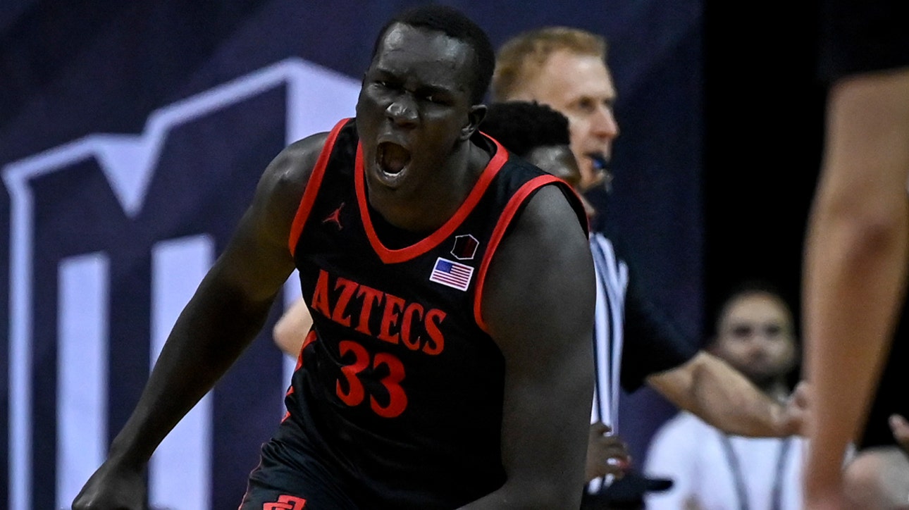 Aguek Arop crashes the boards, throws down IMPRESSIVE put-back slam