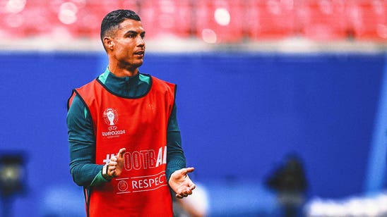 Portugal coach Martinez defends usage of Ronaldo, says he 'deserves' to be with national team